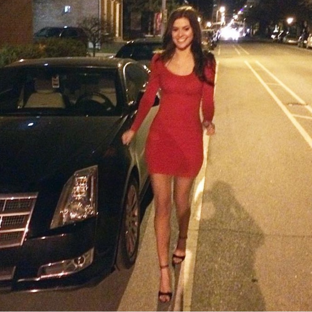 Bodycon red mini dress with ruching on the sides